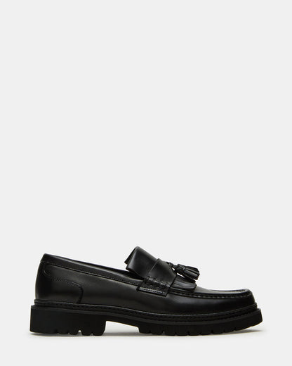 ARTHUS Black Leather Slip-On Tassel Men's Loafer | Steve Madden