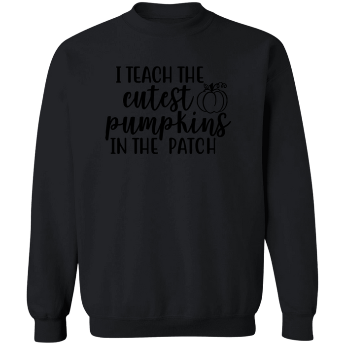I Teach The Cutest Pumpkins In The Patch crewneck sweatshirt in Black