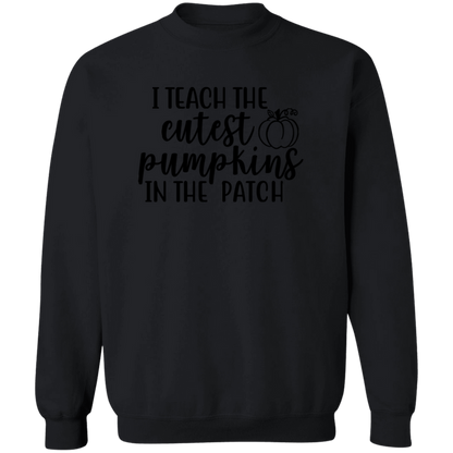 I Teach The Cutest Pumpkins In The Patch crewneck sweatshirt in Black