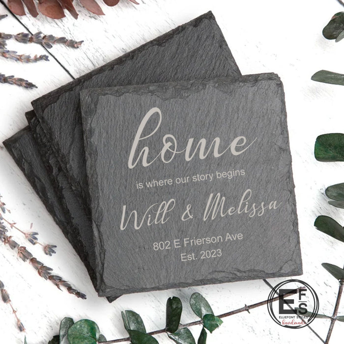 Personalized slate coasters engraved with Home Is Where Our Story Begins name and address