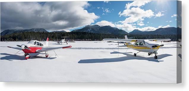 Snow Covered Airplanes at Lake Tahoe Airport - Canvas Print
