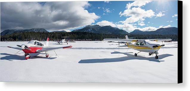 Snow Covered Airplanes at Lake Tahoe Airport - Canvas Print