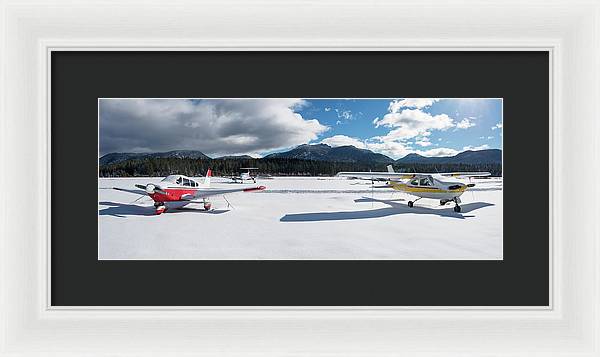 Snow Covered Airplanes at Lake Tahoe Airport - Framed Print