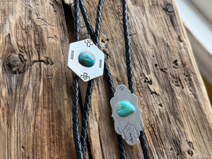 The Wildsmith Hand-Stamped Black Leather & Silver Western Adventure Bolo Tie